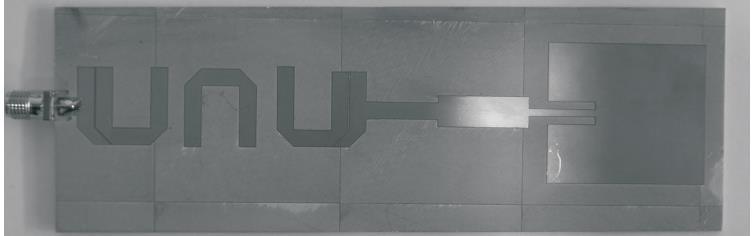 That way, dimensions of the whole structure were partially reduced. A layout of this filtenna is shown in Figure 2.7 and the equivalent circuit of the filtenna is given in Figure 2.8. Figure 2.7 The photo of the filtenna with the hairpin filter [10] Figure 2.