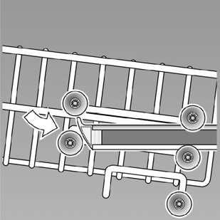 Pour le faire descendre, appuyez, en direction de l intérieur et successivement, sur les deux leviers situés à gauche et à droite sur le côté extérieur du panier.