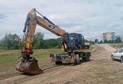 kladivo CAT H115S Kolové rýpadlo CAT M322 D otočný o 360 šířka stroje 2,67 m šířka radlice 2,75 m provozní hmotnost 23,5 t