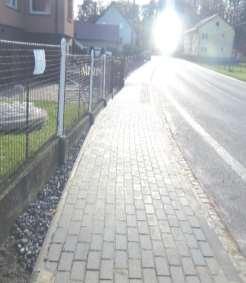Dosavadní, převážně asfaltový, povrch chodníkového tělesa vykazoval značné nerovnosti s četnými trhlinami, propadlinami kolem kanalizačních vpustí a nesoudržnost žulových obrubníků.