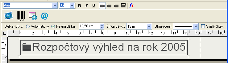 Používání Editoru pásků Vybrané ohraničení orámuje text. Velikost písma je dle potřeby zmenšena tak, aby text nepřekročil okraje štítku.