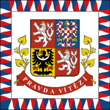 Vlajka prezidenta České republiky dříve prezidentská standarta je bílá, s okrajem skládajícím se z plaménků střídavě bílých, červených a modrých uprostřed