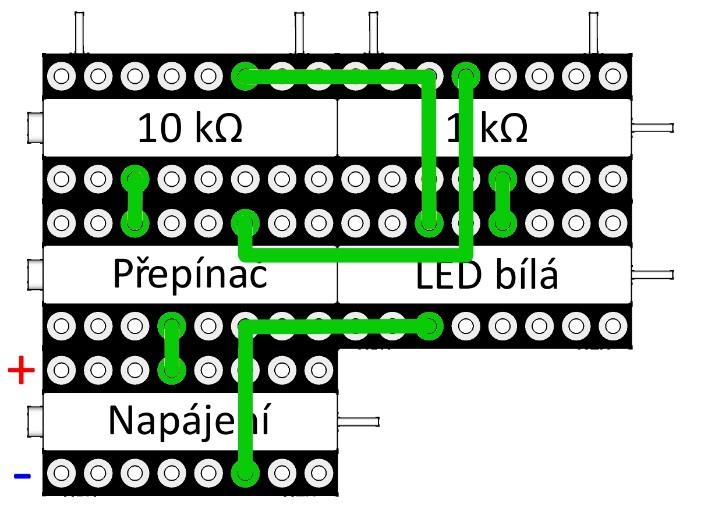 Obrázek 2: Elektrotechnické schéma zapojení; Obrázek 3: Zapojení realizované na stavebnici Další možnosti jak pracovat se stavebnicí zejména u zkušenějších uživatelů jsou následující: Nalezení chyby