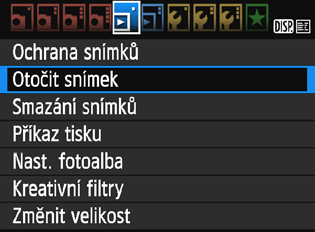 b Otočení snímku Zobrazený snímek můžete otočit na požadovanou orientaci. 1 Vyberte položku [Otočit snímek]. Na kartě [x1] vyberte položku [Otočit snímek] a stiskněte tlačítko <0>.