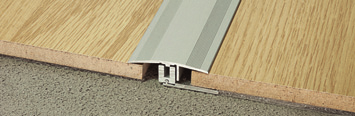 Profily pro dřevěné a laminátové podlahy Alfix 615 je profesionální systém pro pokládku dřevěných a laminátových podlah od 6 do 15 mm.