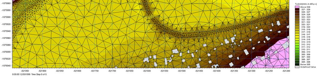 Domy a bloky domů jsou z výpočetní sítě vyňaty (v matematickém modelu jsou tedy obtékány ); ploty a jiné překážky podobného charakteru byly simulovány pruhy zvýšené drsnosti. Na obrázku Obr.