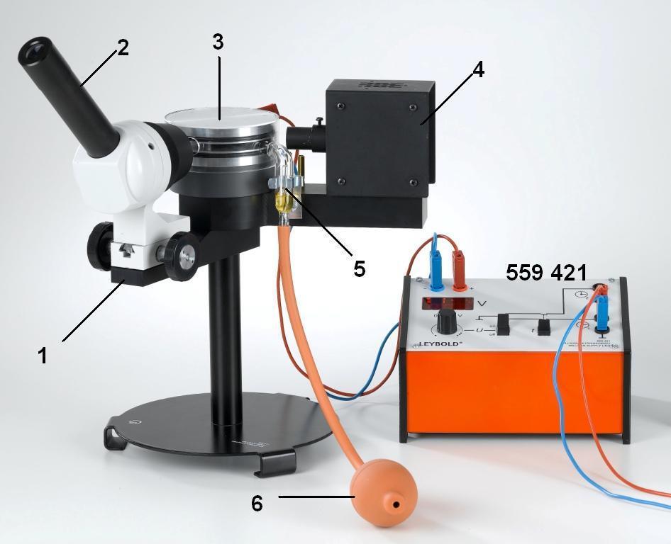 1. Popis 1. Základní deska 2. Měřicí mikroskop s mikrometrickým okulárem 3. Deskový kondenzátor 4. Osvětlovací jednotka 5. Olejový atomizér 6.