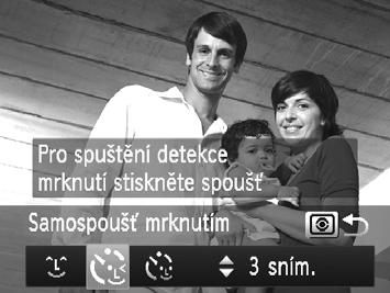 Speciální režimy pro jiné účely Použití samospouště mrknutím Namiřte fotoaparát na fotografovanou osobu a stiskněte tlačítko spouště až na doraz.