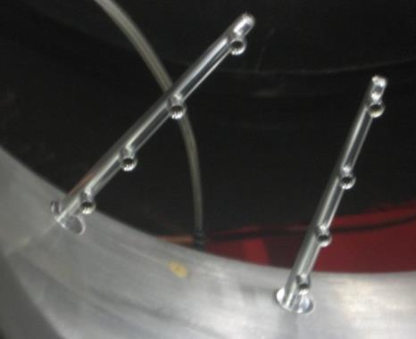 Měřicí systém je doplněn o dvě tříotvorové sondy umístěné na ručním traverzéru v rovině před vratnými lopatkami (obr.