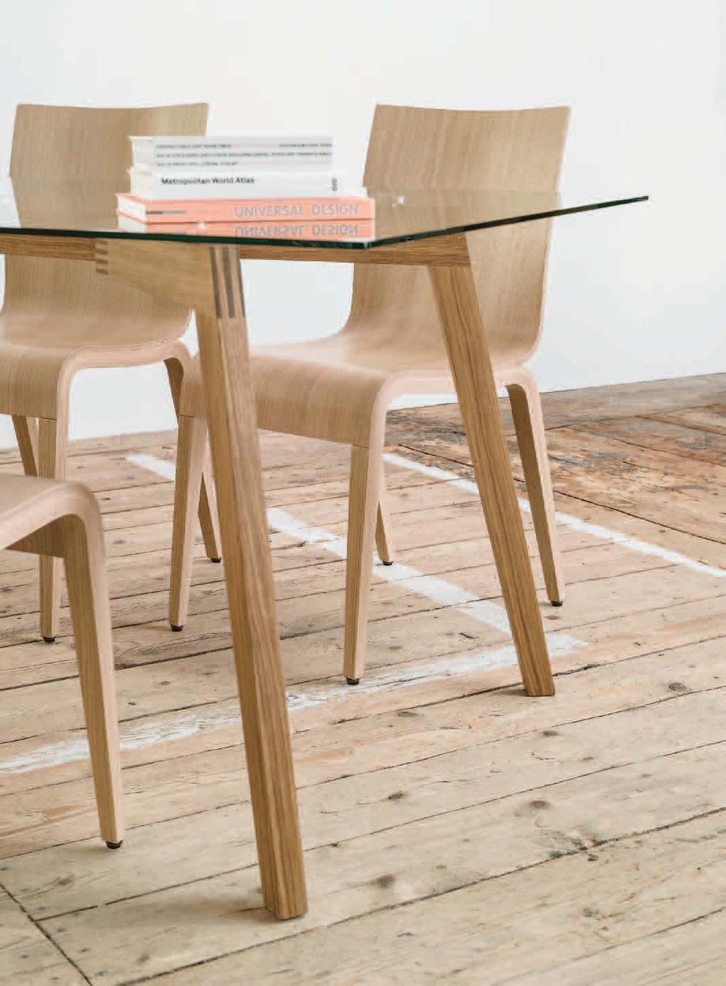 The table Similda will immediately draw your attention to its symmetrical wooden legs design.