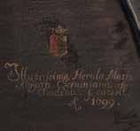 Augustin, myjící nohy Kristu v podobě poutníka. Po pravé straně je kartuše s minuskulním nápisem: Perillustris ac Generosus / Dominus Georgius Ad / Janovsky Eques / de Janovitz.