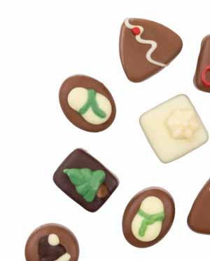 SVÁTEČNÍ PRALINKY Výjimečné čokoládové pralinky s vynikajícími náplněmi. CUPCAKES Pěkné pohádkově barevné čokoládky ve tvaru slavných amerických muffinů.