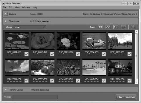 1 V části Import pictures and videos (Importovat snímky a videosekvence) klepněte na tlačítko Change program (Změnit program).