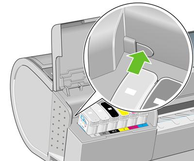 Stiskněte tlačítko za inkoustovými kazetami, tím uvolníte