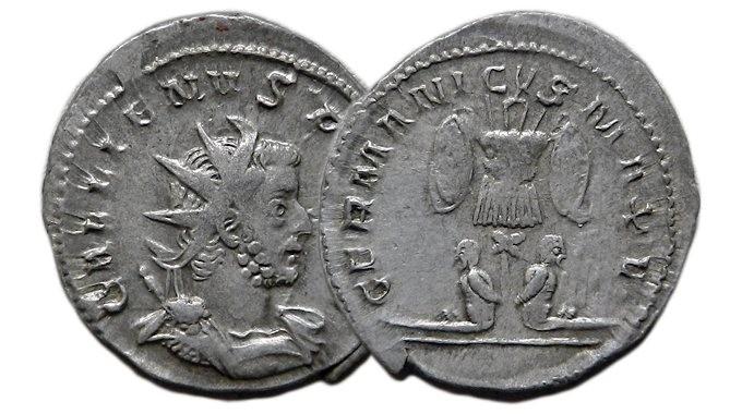 Častý motiv císařů 4. století znázorněný dvěma vojáky stojícími proti sobě a držícími jednu či dvě vojenské zástavy.
