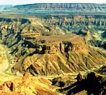 Pokračování kfish River Canyon, druhému největšímu kaňonu na světě. 161km dlouhá oblast, tvrdé, kamenité a odolnými sukulenty porostlé pláně, je velkolepým dílem přírody.