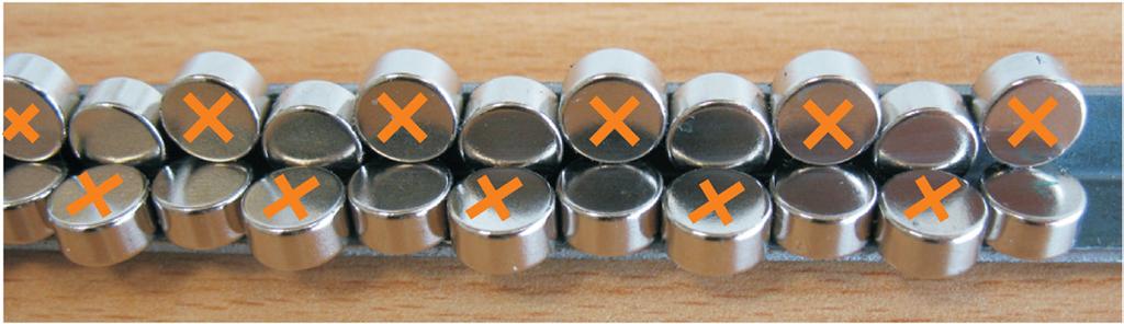 Příloha D1: How to simply demonstrate diamagnetic levitation with pencil lead V Koudelkova Figure 2. Magnet arrangement in the track. Figure 3. Pencil lead levitates inside the track.