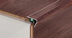 Profily pro dřevěné a laminátové podlahy Profil G/4 je schodový profil. Využívá se jako dilatace pro dřevěné nebo laminátové podlahy o tloušťkách od 6,5 do 15 mm.