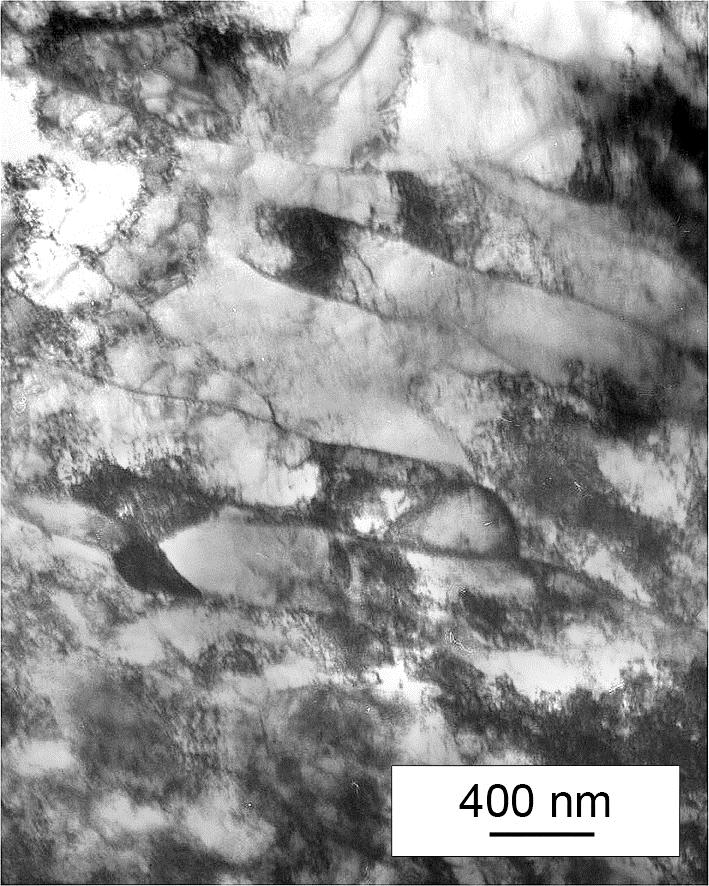 For the most parts, in deformed bars, the structure of parallel bands of elongated, formerly equiaxed, ferrite grains is present, Fig. 3.