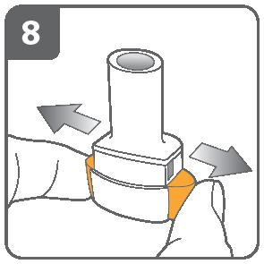 Propíchněte tobolku: Držte inhalátor ve vzpřímené poloze s náustkem nahoru. Propíchněte tobolku současným pevným stiskem obou postranních tlačítek.