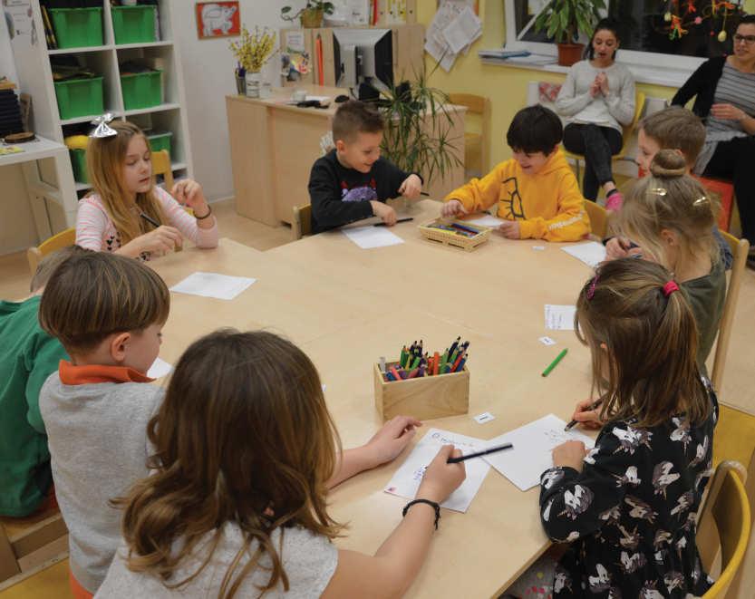 Children, with the help of teachers, transformed their classrooms into dormitories, enjoyed a nice dinner together and gathered in the small gym at 19:00, where the activities for this year s book