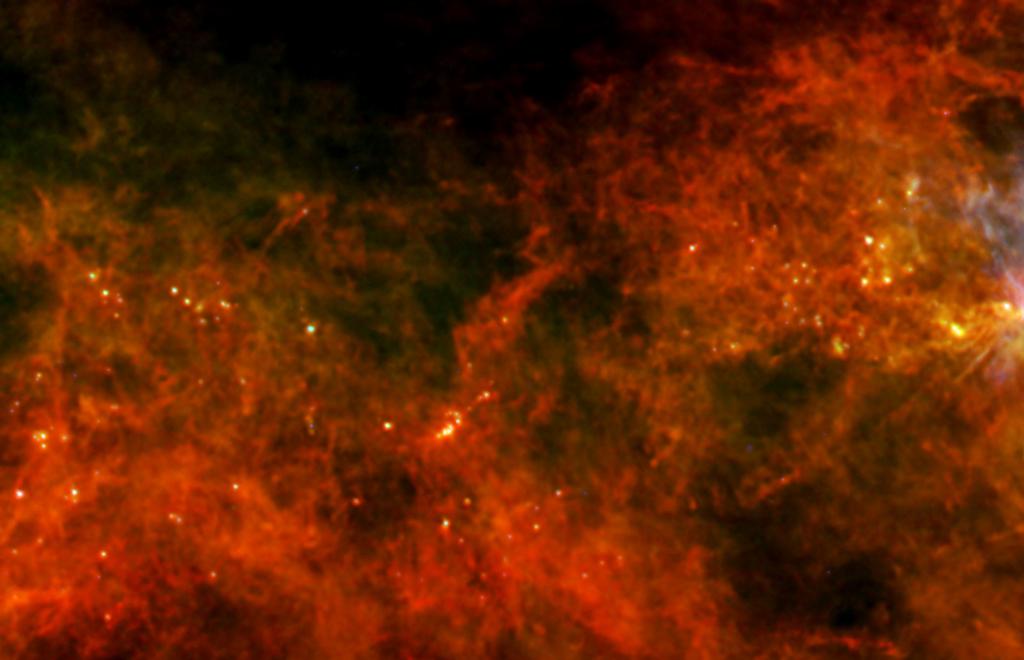 Molekulární oblak Vela C je složen z mnoha plazmových vláken. V jejich zúženích vznikají nové hvězdy. Foto Herschel, IR obor.