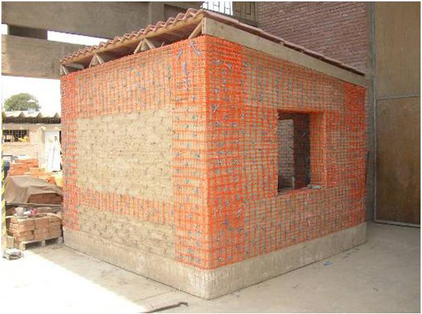 3.4.8 Plastic mesh reinforcement The adobe model shown in Figure 3.8 was reinforced with bands of plastic mesh located in the regions where most damage was expected on the adobe walls (Blondet et al.