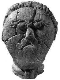 t é m a Opuková hlava z doby laténské s typickým nákrèníkem, nalezená na keltském hradišti u Mšeckých Žehrovic. ð Pokraèování z pøedchozí strany.