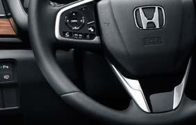 Asistent pro jízdu v kolonách Δ Páčky řazení pod volantem Δ Kožený volant Kožená hlavice řadicí páky (pouze s manuální převodovkou) Systém Honda CONNECT s navigací Garmin: 7" dotyková obrazovka,