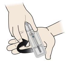Plastový obal prevráťte a jemne zatlačte na stred jeho zadnej strany, aby sa vám injekčná striekačka uvoľnila do dlane.
