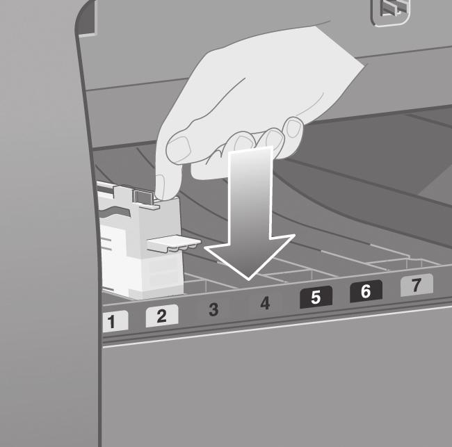 Push the printhead cleaner in and down until it clicks into place.