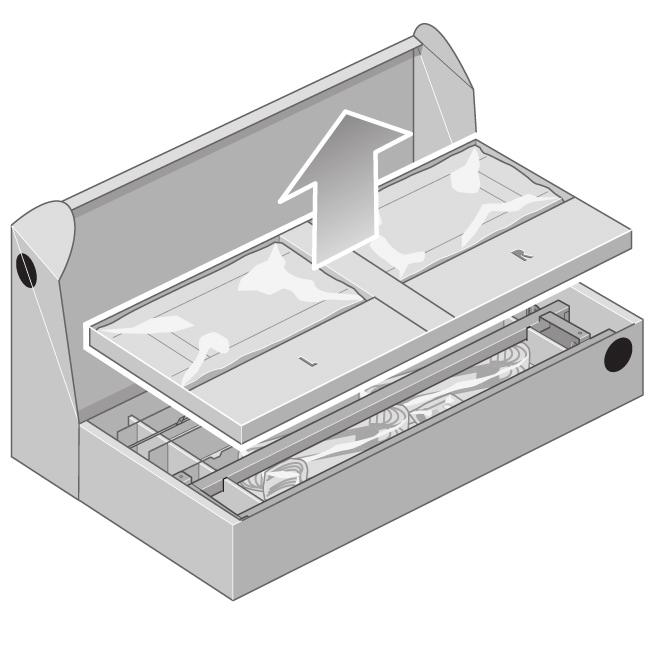 Při rozbalování noh uvidíte kolem dvou koleček na spodku protiskluzový materiál. NESNÍMEJTE ještě tento materiál. Remove the first tray from the stand and bin assembly box.