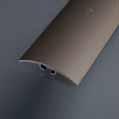 PŘECHODOVÉ PROFILY Přechodový profil vrtaný 60 6,5 mm NOVINKA Hliníkový přechodový profil s otvory na zapuštěné šrouby se používá na ukončení nebo plynulý přechod mezi podlahovými materiály s