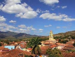 Oběd vrestauraci La Boca (fakultativně), odjezd do Playa Giron, možnost návštěvy Muzea Invaze. Pokračování v cestě do města Cienfuegos, krátká prohlídka města aodjezd do Guajimico.