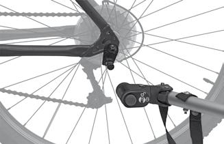 Montáž vozíku Croozer jako přívěsný vozík za jízdní kolo Montáž spojky nápravy na tažné jízdní kolo Spojka se montuje vždy na levé straně tažného jízdního kola ve směru jízdy.