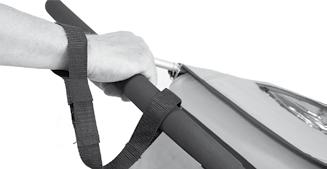 Montáž vozíku Croozer jako Jogger Použití záchytného popruhu Aby Croozer při posouvání na cestách se spádem nemohl nedopatřením vyklouznout z rukou a odjet, měli byste si vždy otočit kolem zápěstí