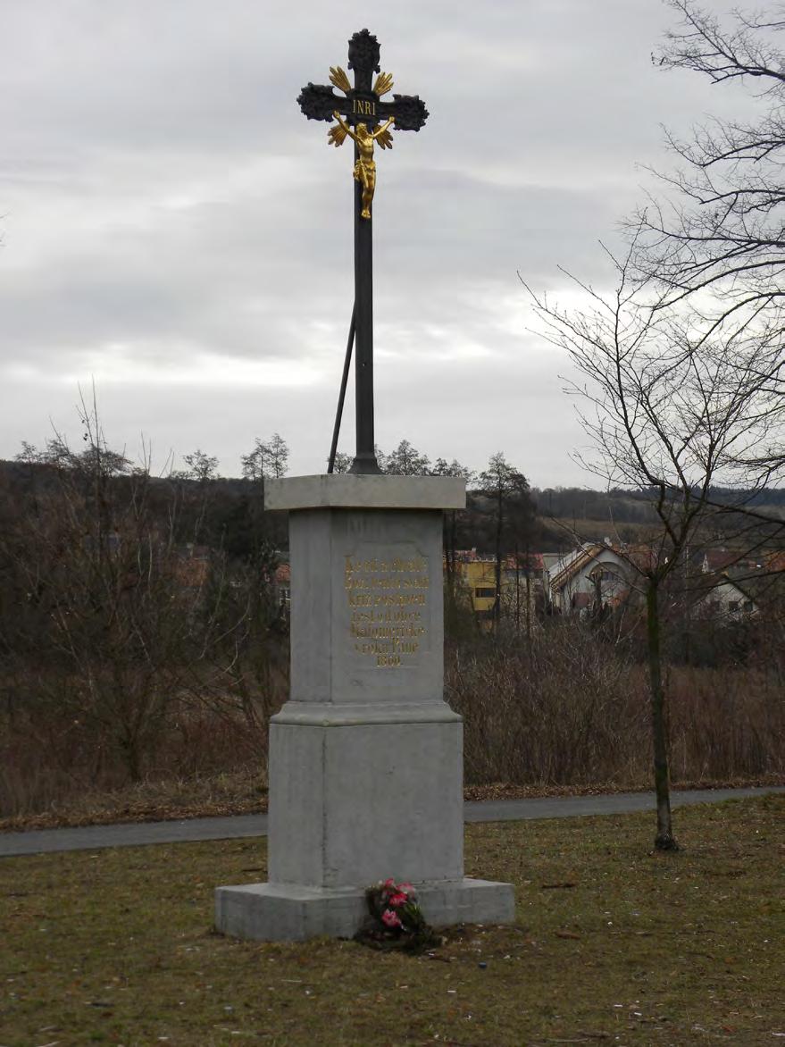 Původní kříž na bývalém maloměřickém hřbitově, nově rekonstruovaný v roce 2000.