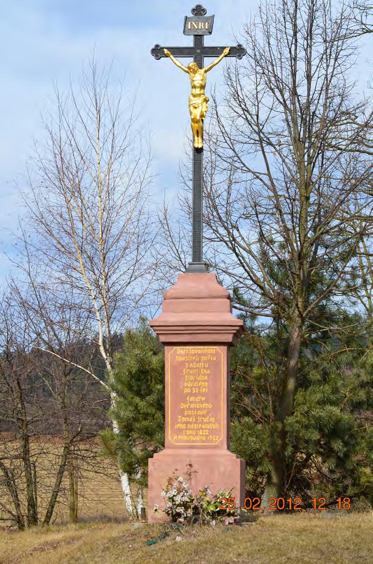 Kříž stojící u silnice mezi obcemi Obřany a Bílovice nad Svitavou, byl vybudován v roce1822, renovován v letech 1922 a 1995.