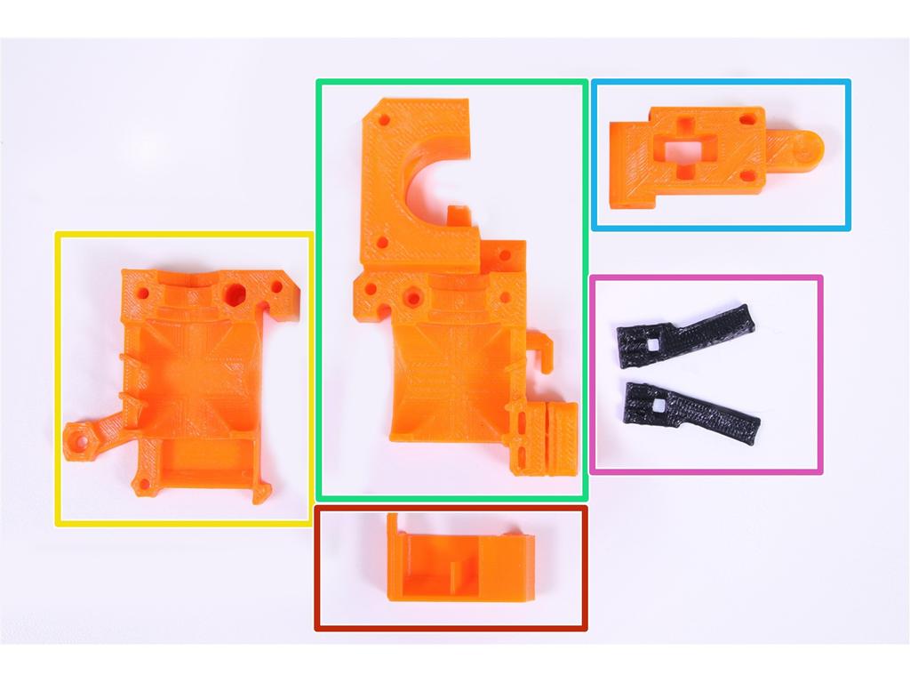 Extruder idler (přítlačná kladka extrudéru) Fan nozzle (kryt ventilátoru může být