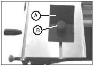 2.6 Mounting clamping plate Place the clamping plate (A) on the sliding carriage and fix it by knuled screw B. 12.2.7 Mounting ON-OFF switch