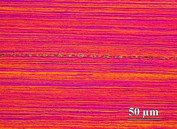 11,9 118 při 300 C 391 365 12,0 114 Obr. 1. Fáze ve výlisku, podélný směr, neleptáno Fig. 1. Phases in the extrusion, longitudinal direction, without etching Obr.