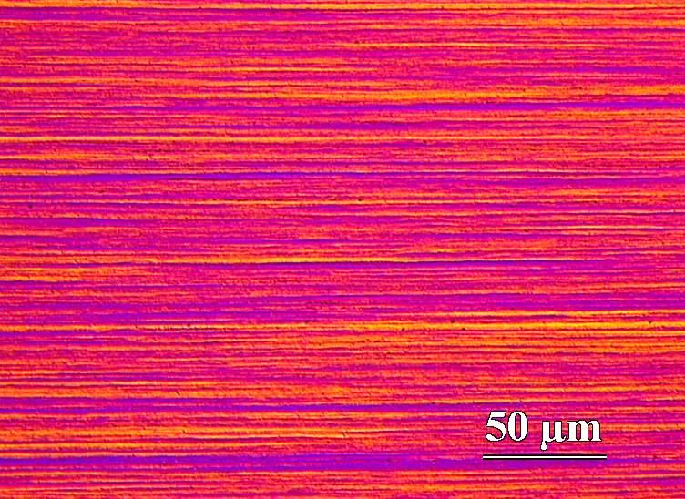 Structure of the extrusion, longitudinal direction, etched Obr. 3.