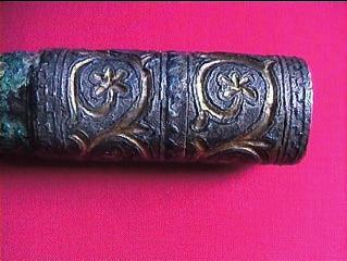 a c b d Fig. 5. Kouřim, Graves 55 (a, b) and 120 (c, d). An imported oriental war axe (hammeraxe?