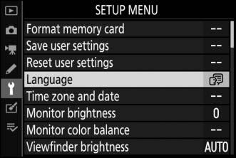 Volba jazyka a nastavení hodin Při prvním zobrazení menu je automaticky vybrána položka pro nastavení jazyka v menu nastavení. Vyberte jazyk a nastavte hodiny fotoaparátu. 1 Zapněte fotoaparát.