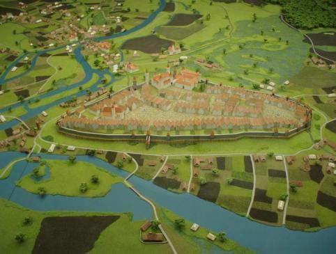 Obrázek 1.13 Rekonstrukce středověké fortifikace Hradce Králové Náměstí (jedno nebo více náměstí) bylo centrem města a mělo funkci obchodní a trhovou a v době válek i obrannou.