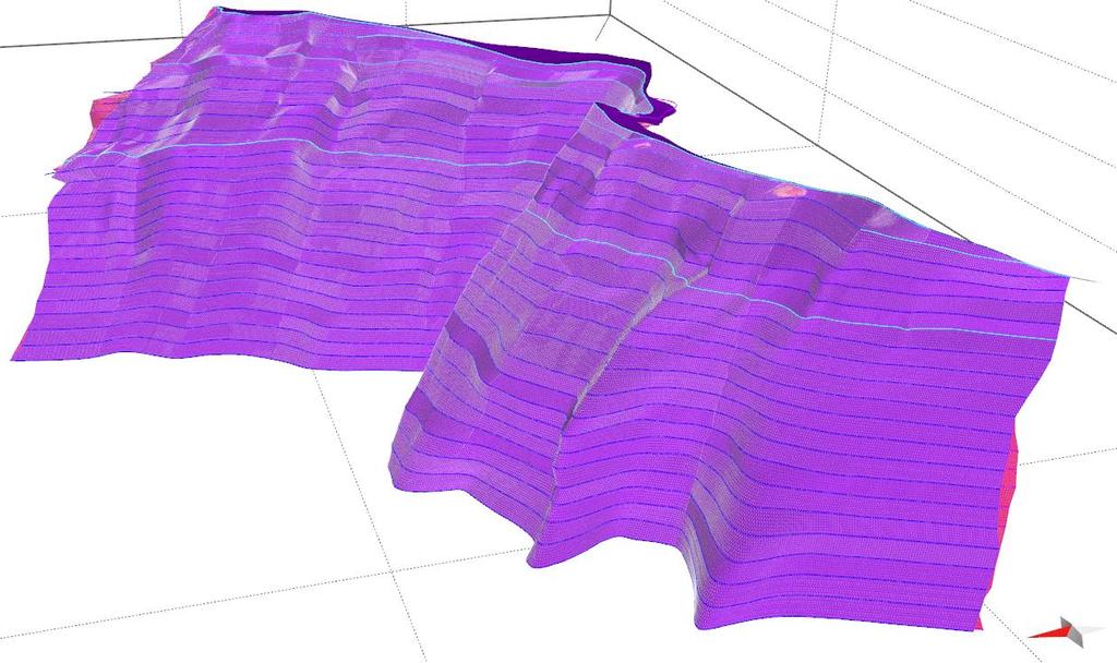 Obr. 14: Třetí verze modelu grafitové polohy s chybou překryvu ploch (růžové plochy) a morfologickým stupněm (severní část v okolí světle modré linie).