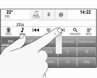 Umístěte prst na volicí interaktivní panel a přesuňte ho nahoru, až bude viditelný jeden řádek oblíbených položek. Musí působit stálý tlak a prst se musí pohybovat stálou rychlostí.