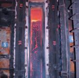 Po proběhnutí koksovacího cyklu, který trvá mezi 32 a 34 hodinami, je horký koks vytlačen z komory do hasicího vozu, který převeze horký koks do hasicí věže, kde proběhne zchlazení koksu