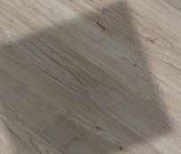 A distinctive oak texture with colours which transition from light brown to yellow and on to fine lines in a dark chocolate shade.