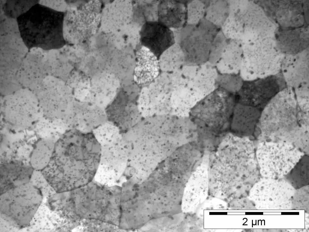 Obr. 3. Příčný řez zkompaktizovanou slitinou AlMn5 (TEM) Fig. 3. A TEM micrograph of AlMn5 alloy in transversal section Obr. 4.